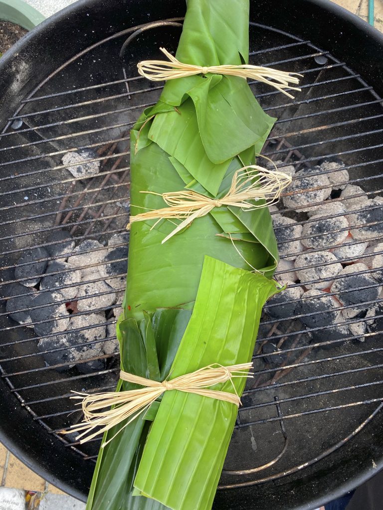 Trout cooked in banana leaves
